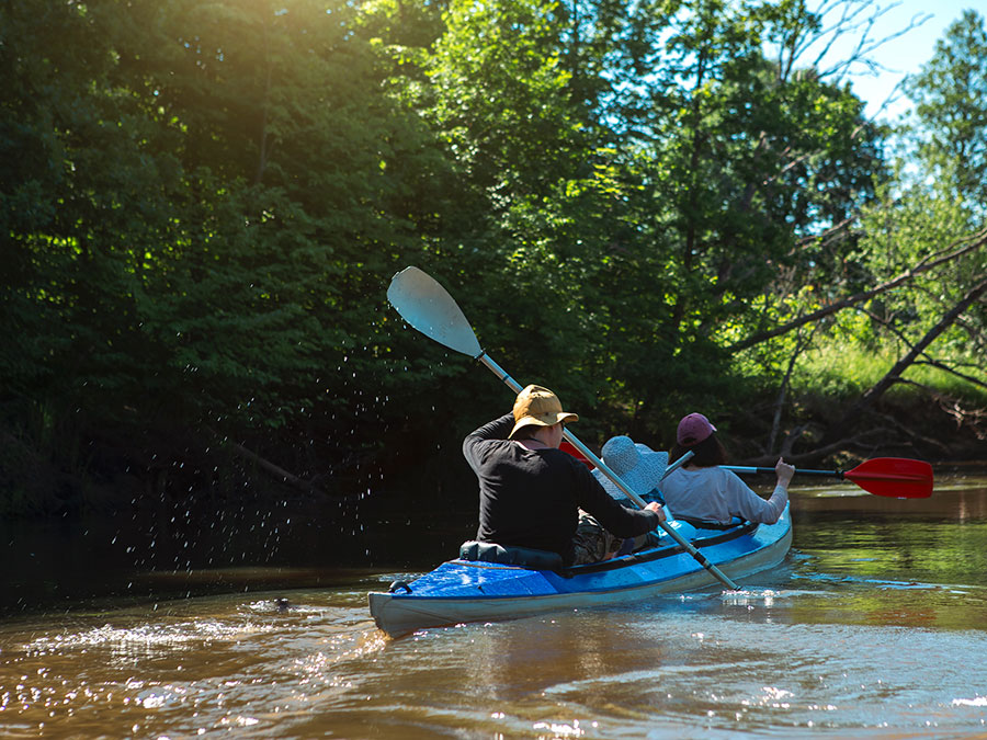 https://stowevt.com/wp-content/uploads/2024/10/man-and-woman-couple-in-family-kayak-trip-rowing-b-2023-11-27-05-01-04-utc-1.jpg